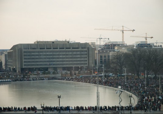 The crowds gathered around the reflecting pool. 