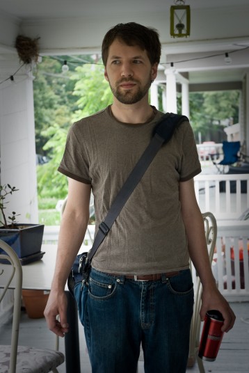Eli on our old porch, leaving for his first day of being a full time employed web designer. 