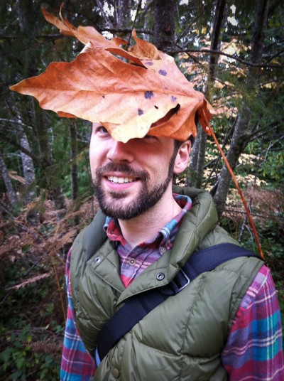 Eli with a leaf on his head.